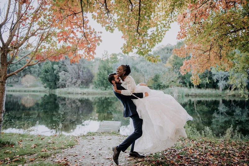 Bride and groom embracing in the gardens at Redbrow Gardens wedding venue in Canberra