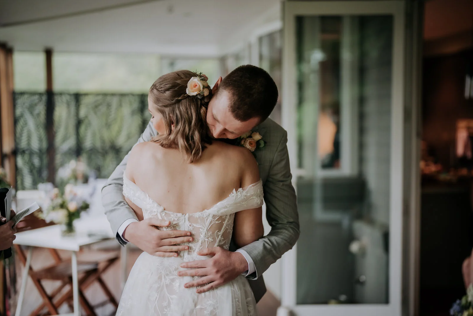 Bride and groom sharing a joyful moment at their intimate backyard wedding in Wentworth Falls, photographed by Ava Me Studios